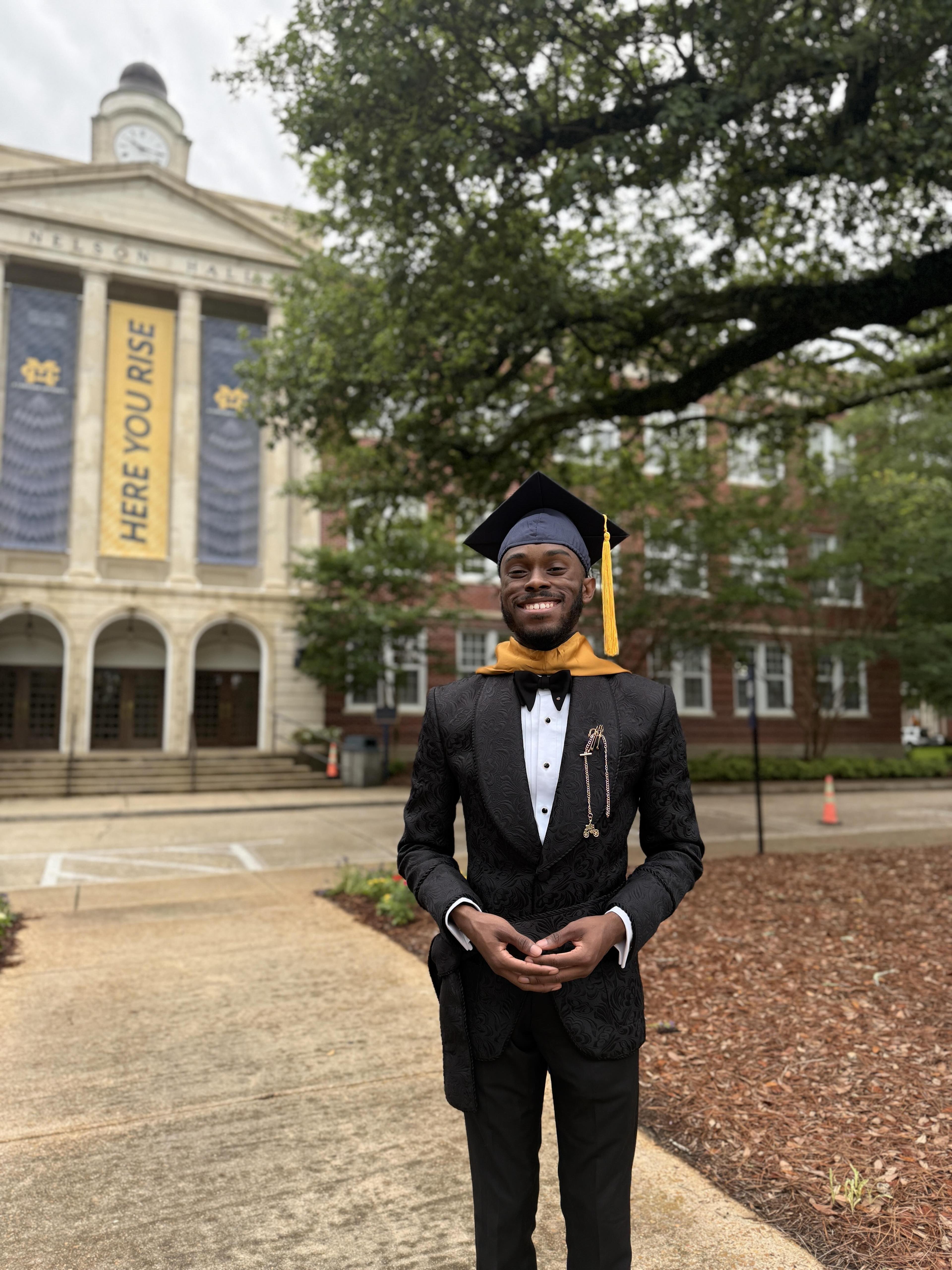 Dalron at his master's graduation
